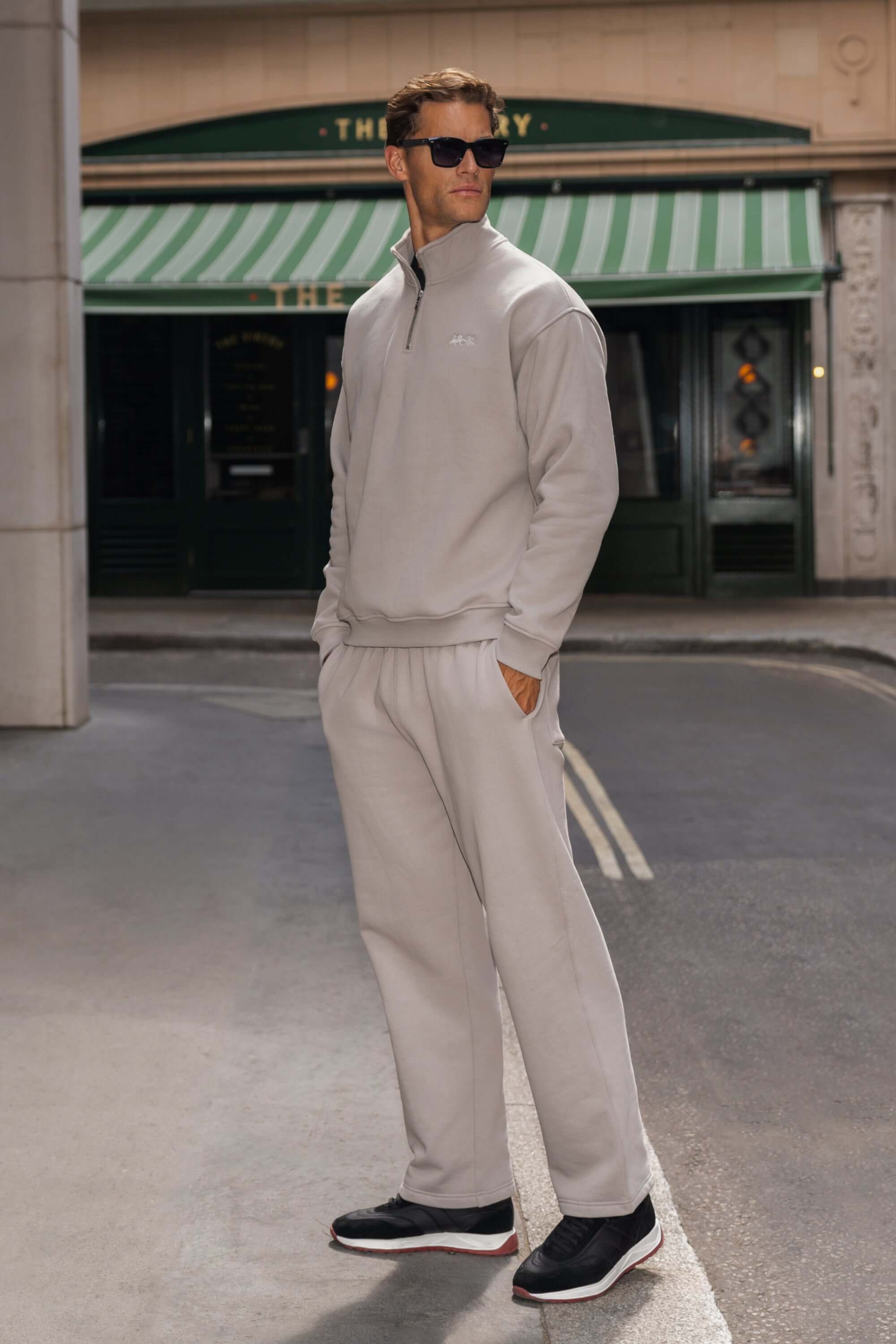 THE MILAN QUARTER ZIP SWEATER