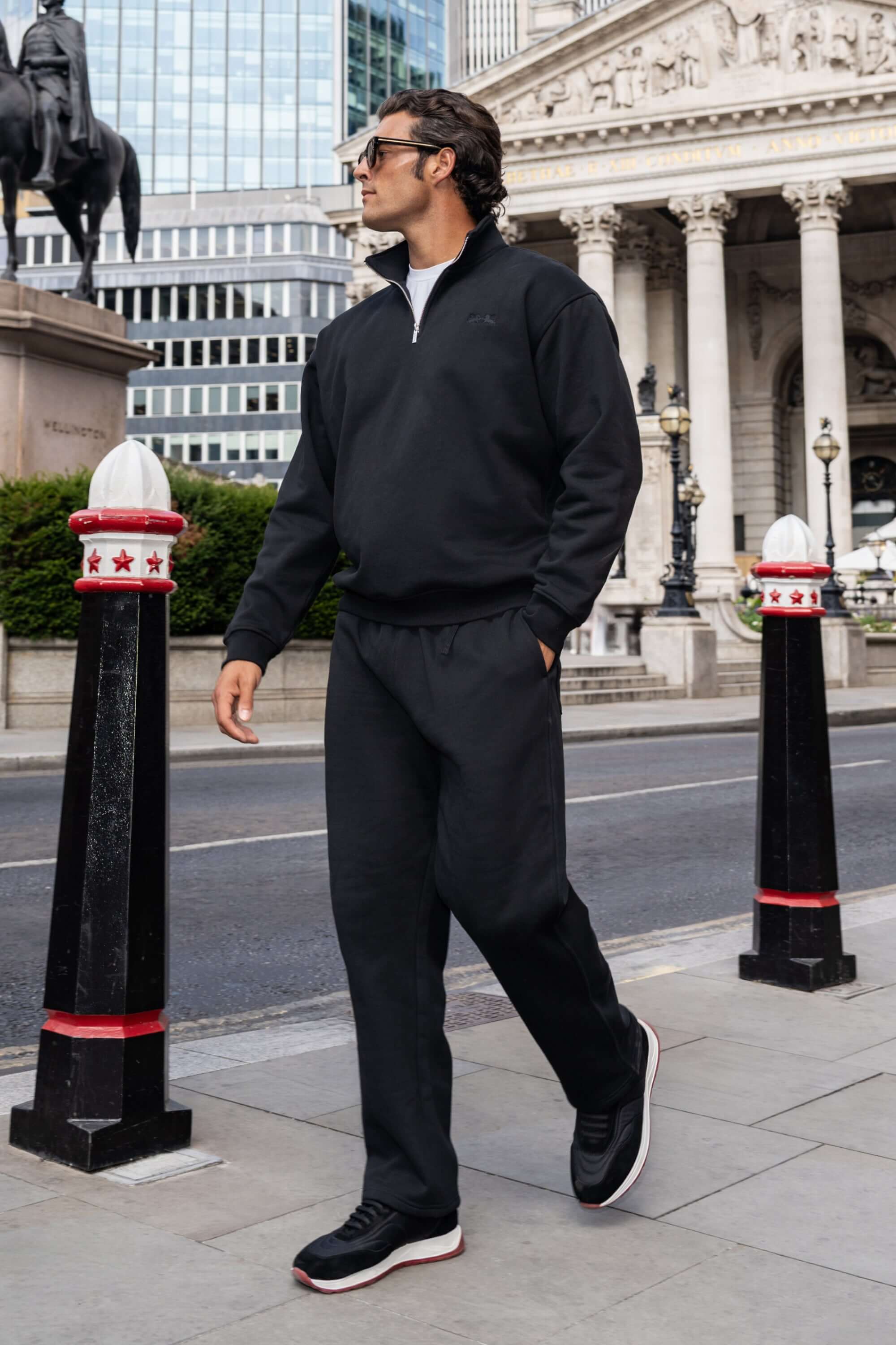 THE MILAN QUARTER ZIP SWEATER
